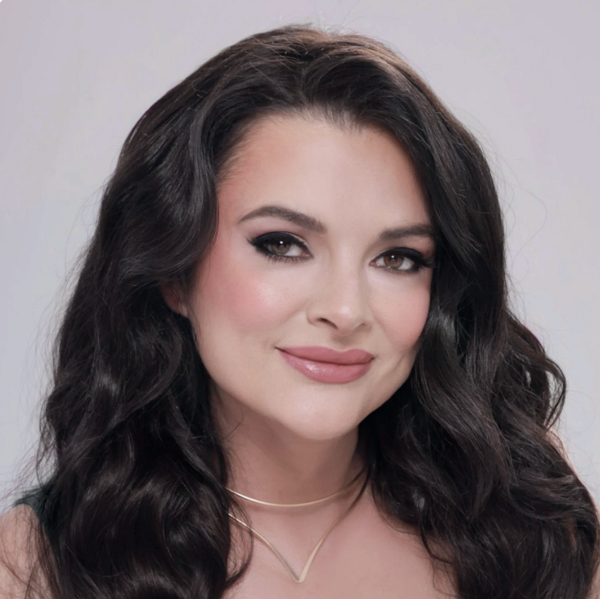 Aimee Carr, CEO and founder of Voodoo Makeup in Katy, Texas, wearing a polished professional makeup look.
