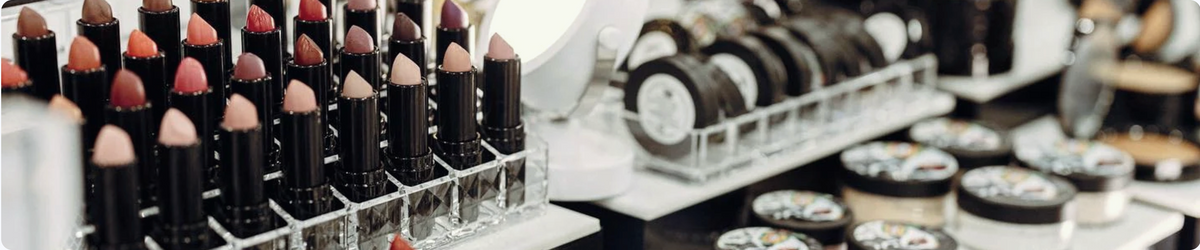 Voodoo Makeup lipstick shades and professional cosmetics displayed at a beauty counter in Katy, Texas.